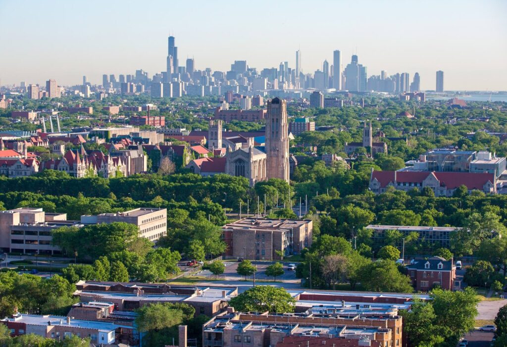 An aerial view of the campus facing northwest with downtown Chicago in the background.